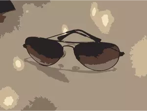 Sunglasses on table vector image